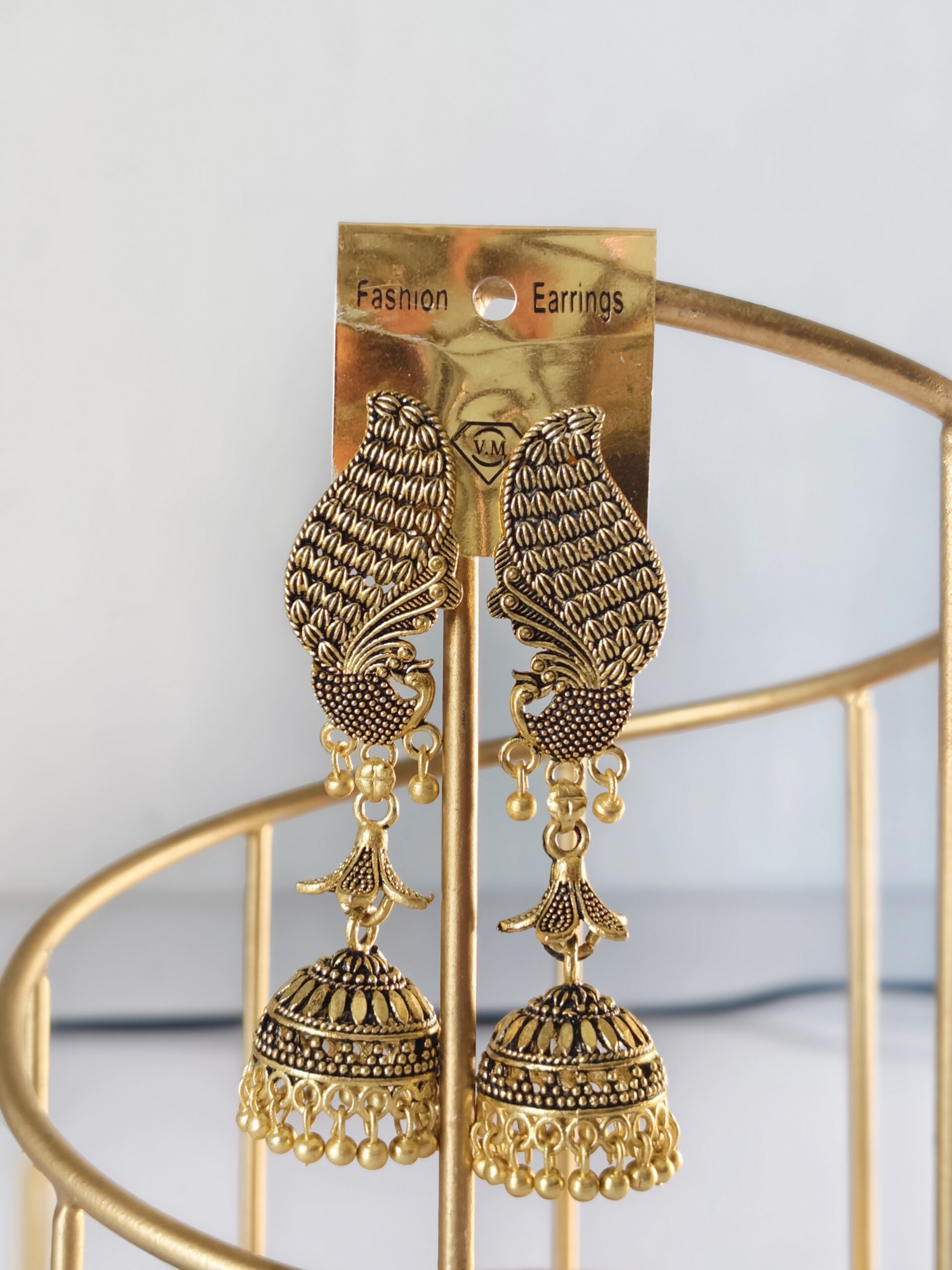 Mayura Pearl Glow Peacock Jhumka Earrings